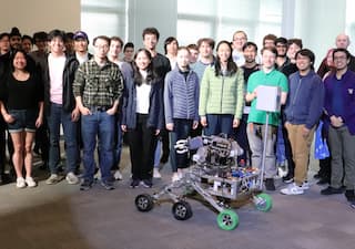 Group photo of the 2024 rover reveal with Viator